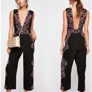 NWT Free People Setting Sun Black Print Deep V-Neck Romper in Size Small